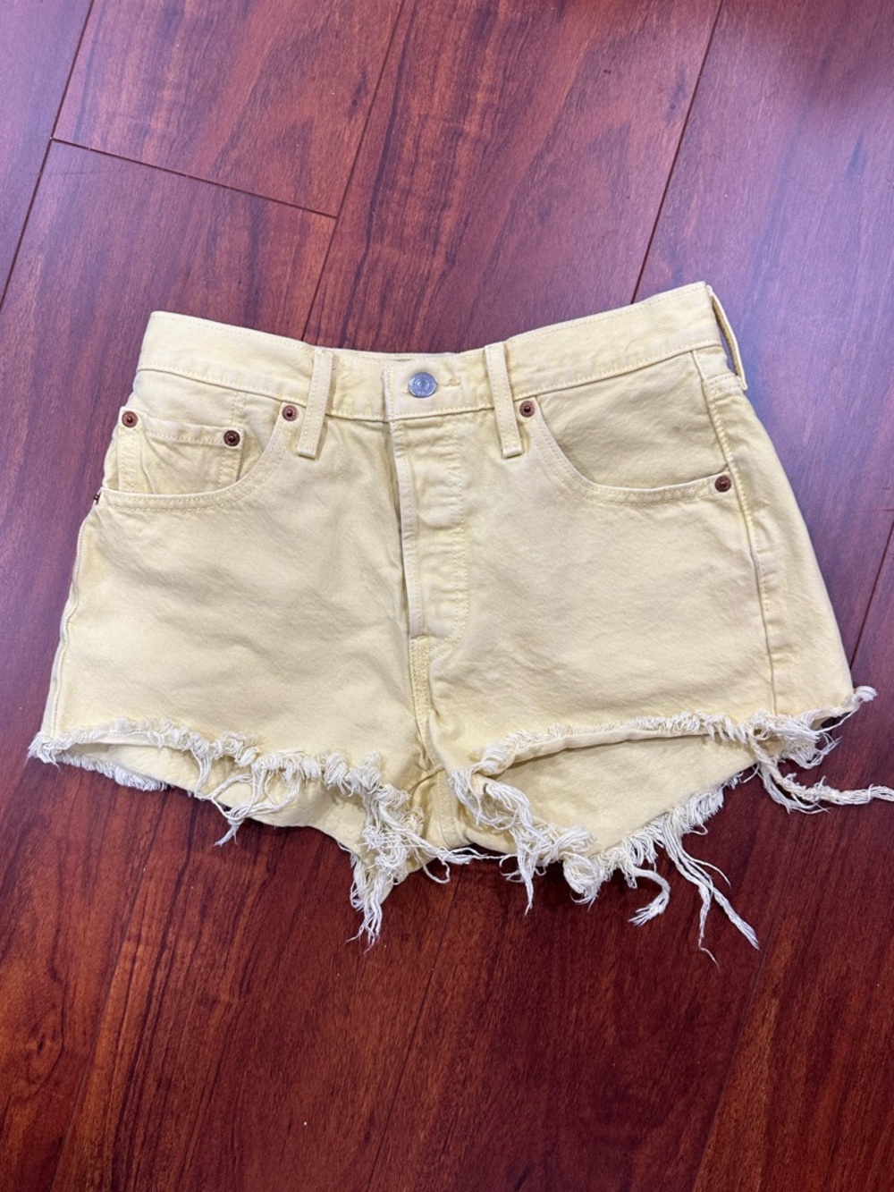 Levi's Butter Yellow Frayed Hem Denim Shorts